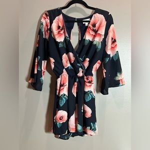 NWT Francesca’s Navy Floral Bell Sleeve Romper​​​